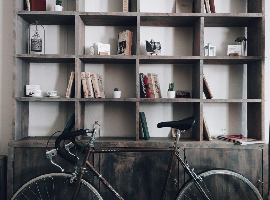 bicycle leaning on shelf